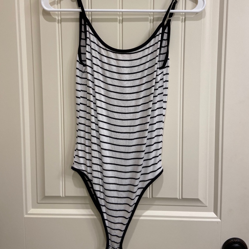 Black and white striped body suit